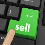 Klawisz „sell” symbolizujący sprzedaż internetową.